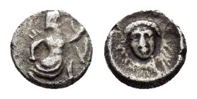 CILICIA.Uncertain Satrap (BC 4th cent).Tetartemorion.

Obv : Persian king or hero in kneeling-running stance right, holding dagger and bow.

Rev : Fem...