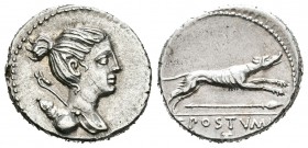 Postumia. Denario. 74 a.C. Roma. (Ffc-1073). (Craw-394/1a). (Cal-1217). Anv.: Cabeza de Diana a derecha con arco y carcaj. Rev.: Perro a derecha, deba...