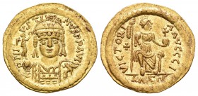 Justino II. Sólido. 574-575 d.C. Alejandría. (Sear-388). (Doc-187). (MIB-12). Anv.: DN IVSTINVS PP AVG. Busto de Justino II de frente con Victoria sob...