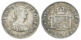 Fernando VII (1808-1833). 1/2 real. 1809. México. TH. (Cal-1336). Ag. 1,68 g. Busto imaginario. Escasa en conservación. EBC+. Est...120,00.