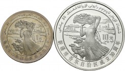 China. 1985. Lote de 2 monedas, 1 yuan (nickel) y 10 yuan (plata). 30º Aniversario de la Autonomía de Xinjiang. En estuche original y con certificado ...