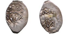 Russia AR Denga - Pskov Republic (1425-1510)
0.79g. XF/VF. Obv: The image of Prince Dovmont in a miter with a sword./ Rev: Beast to the right, in a ci...