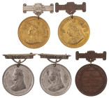 Medaillen Medaillen Ausland vor 1900
 Großbritannien, interessantes Lot aus einer Bronze- und vier Zinnmedaillen, davon zwei vergoldet, am Ansteckkis...
