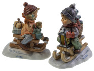 Einzelfiguren
 "Fahrt in die Weihnacht", Hum 396/I in OVP und "Aus der Bahn", Hum 2014, je mit Kind auf Schlitten, beides Vitrinenmodelle