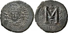 Justinian I, 527-565. Follis (Bronze, 33 mm, 19.41 g, 5 h), Theoupolis (Antiochia), RY 25 = 551/2. D N IVSTINI-ANVS P P AVI Helmeted and cuirassed bus...