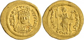 Justin II, 565-578. Solidus (Gold, 21 mm, 4.46 g, 6 h), Constantinopolis. D N IVSTINVS P P AVI Helmeted and cuirassed bust of Justin II facing, holdin...