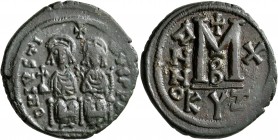 Justin II, with Sophia, 565-578. Follis (Bronze, 30 mm, 14.35 g, 6 h), Cyzicus, 574-575. D N IVSTINVS P P AV Justin, holding globus cruciger in his ri...