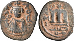 ISLAMIC, Umayyad Caliphate. temp. Mu'awiya I ibn Abi Sufyan, AH 41-60 / AD 661-680. Fals (Bronze, 20 mm, 3.60 g, 5 h), Arab-Byzantine type, Hims. K/A/...