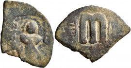 ISLAMIC, Umayyad Caliphate. temp. 'Abd al-Malik ibn Marwan, AH 65-86 / AD 685-705. Fals (Bronze, 19x26 mm, 3.77 g, 10 h), 'Standing Caliph' type, Yubn...