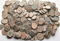 A lot containing 210 bronze coins. All: Byzantine. Fine to very fine. LOT SOLD AS IS, NO RETURNS. 210 coins in lot.