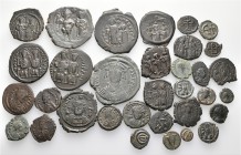 A lot containing 33 bronze coins. All: Byzantine. Fine to good very fine. LOT SOLD AS IS, NO RETURNS. 33 coins in lot.