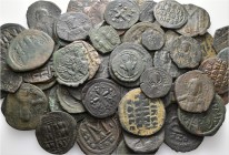 A lot containing 69 bronze coins. All: Byzantine. Fine to very fine. LOT SOLD AS IS, NO RETURNS. 69 coins in lot.