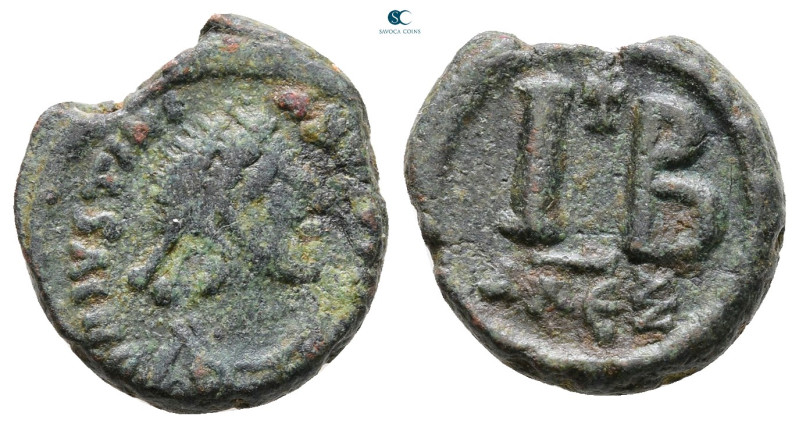 Justinian I AD 527-565. Alexandria
12 Nummi Æ

16 mm, 3,95 g



Good Fine...