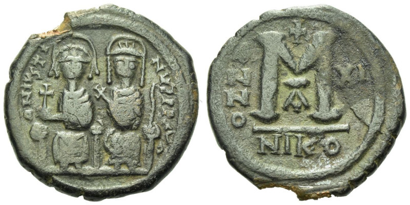 Justin II with Sophia, 565-578 Follis Nicomedia 565-578, Æ 28.00 mm., 11.91 g.
...