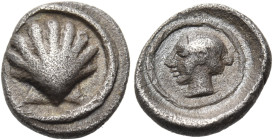 CALABRIA. Tarentum. Circa 470-450 BC. Litra (Silver, 10 mm, 0.70 g, 10 h). Cockle shell within a circular linear border. Rev. Female head (Satyra?) to...