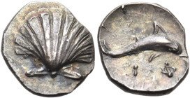 CALABRIA. Tarentum. Circa 325-280 BC. Litra (Silver, 10 mm, 0.69 g, 7 h). Cockle shell. Rev. Dolphin leaping to right; below, IΦ. HN III 979. Vlasto 1...