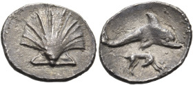 CALABRIA. Tarentum. Circa 325-280 BC. Litra (Silver, 12 mm, 0.56 g, 6 h). Cockle shell. Rev. Dolphin leaping right; below, hound standing right, his h...