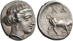 BRUTTIUM. Laos. Circa 453-390 BC. Triobol (Silver, 10 mm, 0.98 g, 6 h). Female head to right, her hair rolled at the sides and back, and wearing penda...