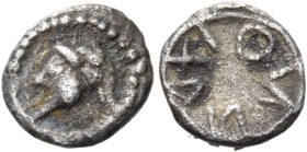 SICILY. Naxos. Circa 530-510 BC. Onkia (Silver, 6.5 mm, 0.14 g). Bearded head of Dionysos to left; border of dots. Rev. ΝΑΧΙΟΝ ( retrograde ) within a...