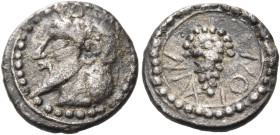 SICILY. Naxos. Circa 510-493 BC. Litra (Silver, 10.5 mm, 0.57 g, 4 h). Head of Dionysos to left, with pointed beard and ivy wreath; border of dots. Re...