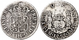1757. Fernando VI. Lima. JM. 2 reales. (Cal. 478). 6,53 g. Columnario. Sin punto sobre la marca de ceca. Perforación reparada. Rayas. Escasa. (BC+).