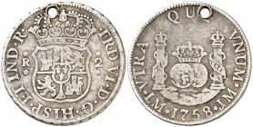 1758. Fernando VI. Lima. JM. 2 reales. (Cal. 479). 6,47 g. Columnario. Punto sobre la marca de ceca. Perforación. Escasa. (BC+).