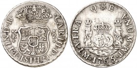 1765. Carlos III. Lima. JM. 2 reales. (Cal. 1259). 6,41 g. Columnario. Sin punto sobre la marca de ceca. Rara. MBC.