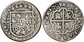 1708. Felipe V. Valencia. F. 2 reales. (Cal. 1443). 4,88 g. Punto entre V y F. Punto en la pata trasera de los leones en reverso. Muy escasa. BC+.
