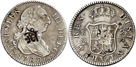 1780. Carlos III. Madrid. PJ. 2 reales. (Cal. 1310). 5,83 g. Gran contramarca oriental en anverso. Rara. MBC+.