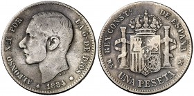 1884*--. Alfonso XII. MSM. 1 peseta. (Cal. 60). 4,78 g. Limpiada. Rara. BC+.