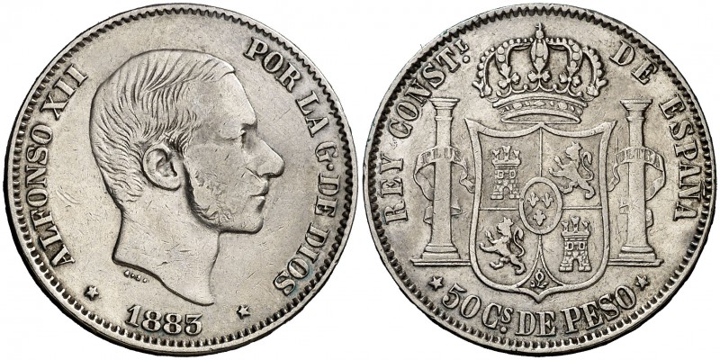 * 1883. Alfonso XII. Manila. 50 centavos. (Cal. 83). 12,89 g. MBC-.