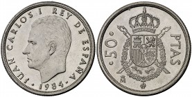 1984. Juan Carlos I. 50 pesetas. (Cal. 67). 12,42 g. Rayita. (S/C).