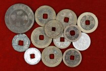 Lote de 13 monedas orientales. A examinar. BC/MBC.