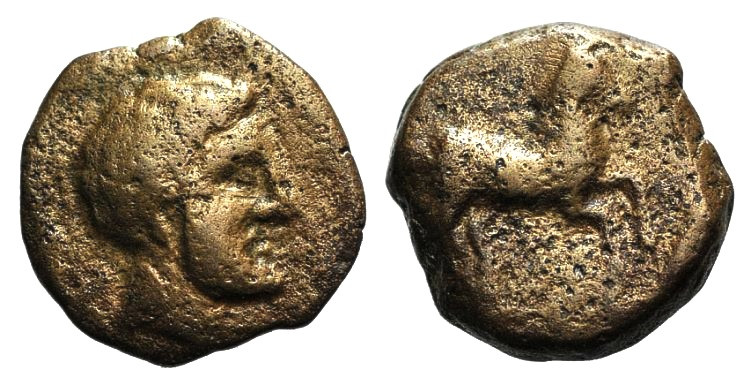 Sicily, Carthaginian Domain, 370-340 BC. Æ (12mm, 1.80g, 10h). Male head r. R/ H...