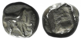 Ionia, Uncertain, c. 5th century BC. AR Tetartemorion (5mm, 0.14g). Head and neck of bull l. R/ Incuse punch. VF