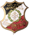 Deutsch-Südwestafrika. 
Emaillierter Anstecker 1900 des Turnvereins Windhuk. mit intaktem Nadelsystem. 
vz