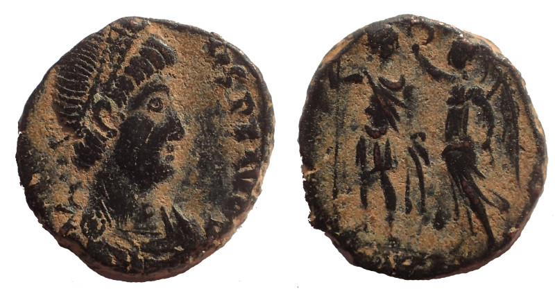 Arcadius AE3. 395-401 AD. 16 mm. 2.8 gm. Obv: D N ARCADI-VS P F AVG, pearl-diade...