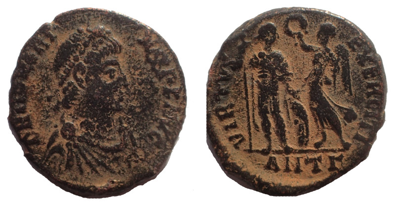 Honorius Follis, Ae 14 mm. 2.5 gm. Antioch mint. Obv: DN HONORIVS P F AVG, diade...