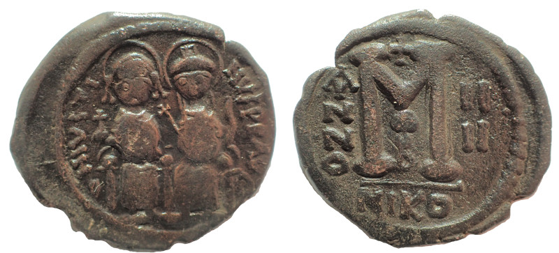 Justin II, with Sophia. 565-578. Æ Follis 33 mm. 14.4 gm. Nikomedia mint, 2nd of...