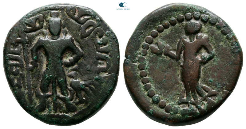 Kushan Empire. Main mint in Begram. Kanishka I AD 127-152. 
Tetradrachm Æ

25...