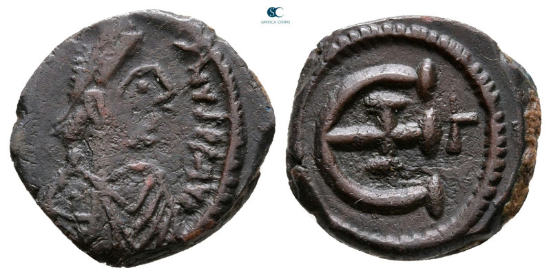 Justinian I AD 527-565. Theoupolis (Antioch)
Pentanummium Æ

15 mm, 2,05 g
...