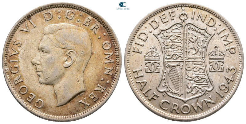 Great Britain. London. George VI AD 1936-1952. 
1/2 Crown AR 1943

32 mm, 14,...