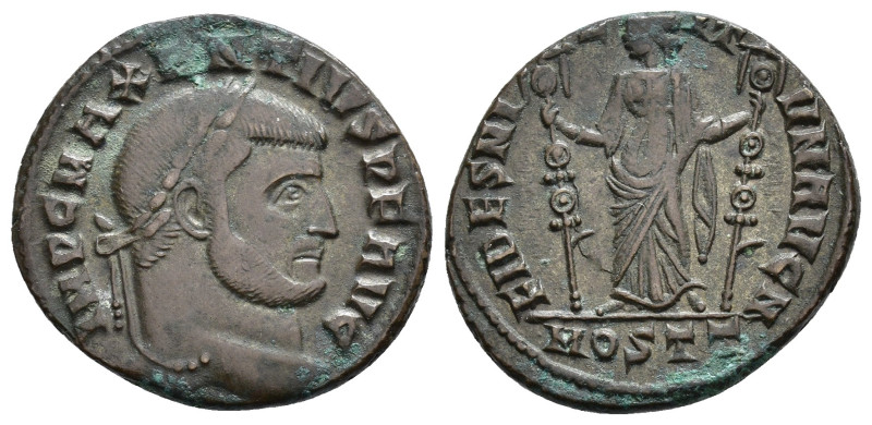 MAJENCIO. Follis. Ostia (309-312). A/ Cabeza laureada a der.; IMP MAXENTIVS P F ...