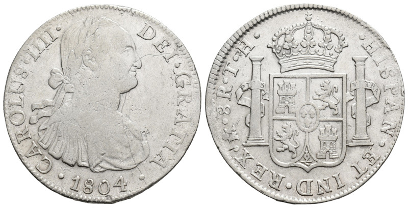 CARLOS IV. 8 reales. 1804. México. TH. AR 26,91 g. 39,4 mm. VI-802. Fina raya en...