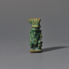ARQUEOLOGÍA. EGIPTO. Baja Época. Amuleto de Bes (664-332 a.C.). Fayenza. Altura 2,3 cm.