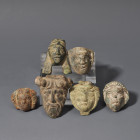 ARQUEOLOGÍA. ROMA. Lote de 6 apliques en forma de rostros (ss. I-IV d.C.). Longitud de 2 a 3,7 cm.

Ex colección Cores.