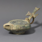 ARQUEOLOGÍA. PALEOCRISTIANO. Lucerna (ss. IV-VII). Bronce. Longitud 12 cm.

Ex colección Cores.