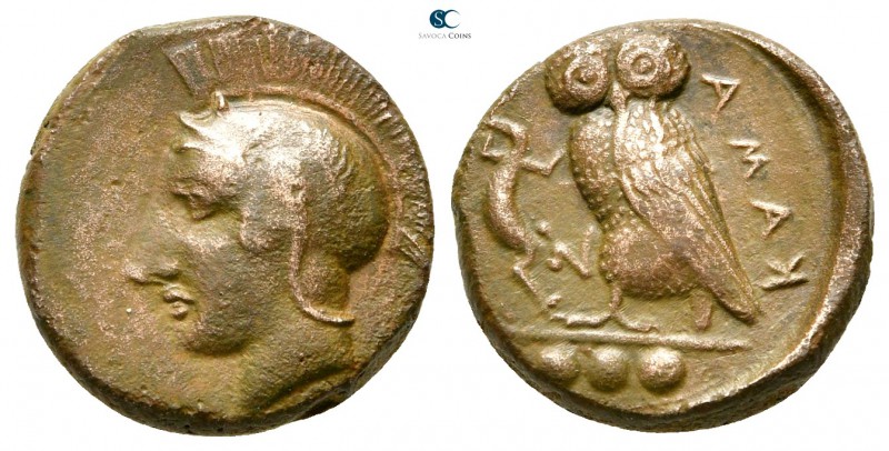 Sicily. Kamarina 420-405 BC. 
Tetras Æ

13mm., 2,78g.

Head of Athena left,...