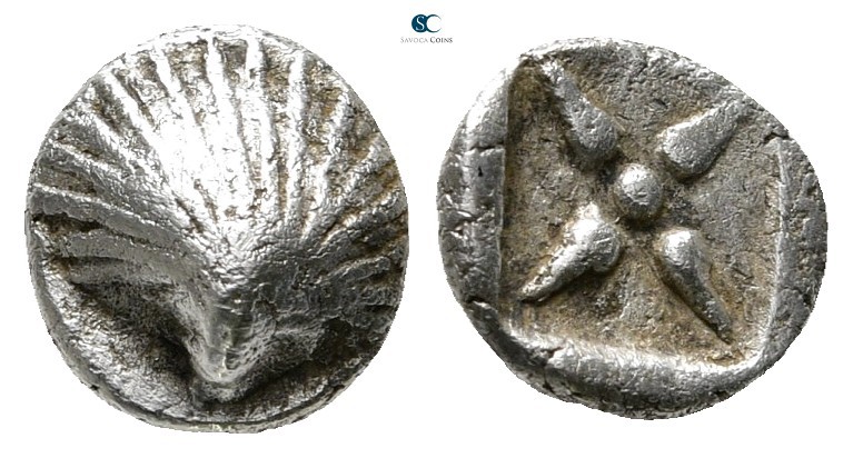 Corcyra. Corcyra 510-480 BC. 
Obol AR

7mm., 0,89g.

Scallop shell / Star o...