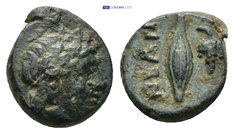 Troas, Neandria. AE. Circa 400-300 BC. (1.38 Gr. 11mm.)
 Laureate head of Apollo...